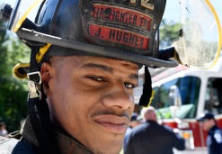 Macon-Bibb County firefighter Joshua Hughes rescued a small 5-month-old mixed terrier dog named Lucky from a house fire. The dog's owner, Valerie Young, was alerted that her house on Birch Street was on fire. She rushed to the scene and ask about her dog and was told that no animal had been removed from the burning home. She let firefighters on the scene know know that she owned a dog that she left in inside the house and beseech them to rescue him. Hughes went back in the smoked filled house and retrieved the dog still in it's kennel, from danger. "He was jumping around when I got to him." Hughes said.
